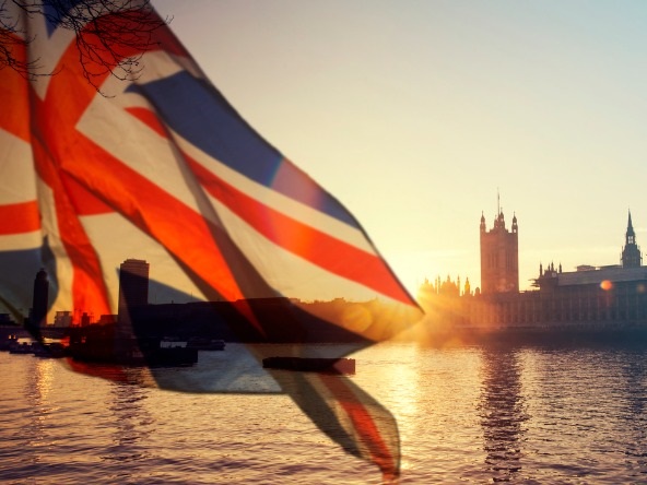 UK flag with parliament in background